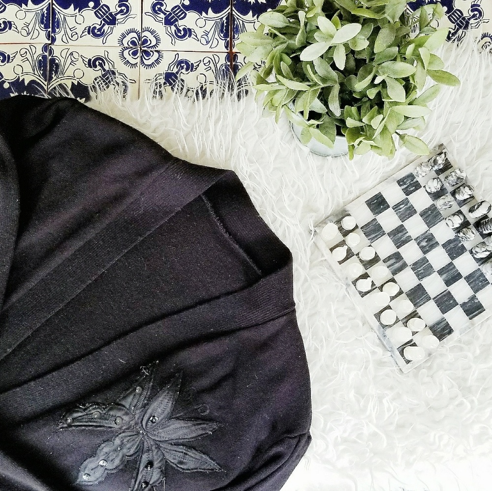 Vintage oversized black sweater with flower detail